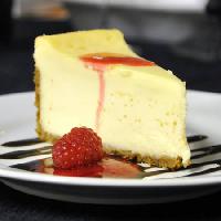 Pixwords Billedet med kage, spiser, ost, hindbær, plade, svedeture Stephen Vanhorn - Dreamstime